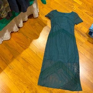 Green/teal long lace dress remind me of 1920s